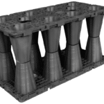 Cover image for UK geocellular attenuation tank selection guide, showing engineer inspecting modules on site
