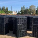 Residential stormwater crate installation showing modular units being placed in trench in Murrieta CA